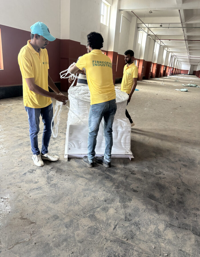Team installing industrial ventilation exhaust fan